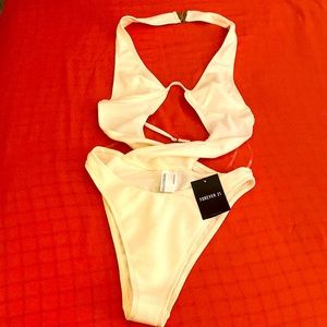Brand new, tag on, M size, cream yellow colour 1 piece swimwear.